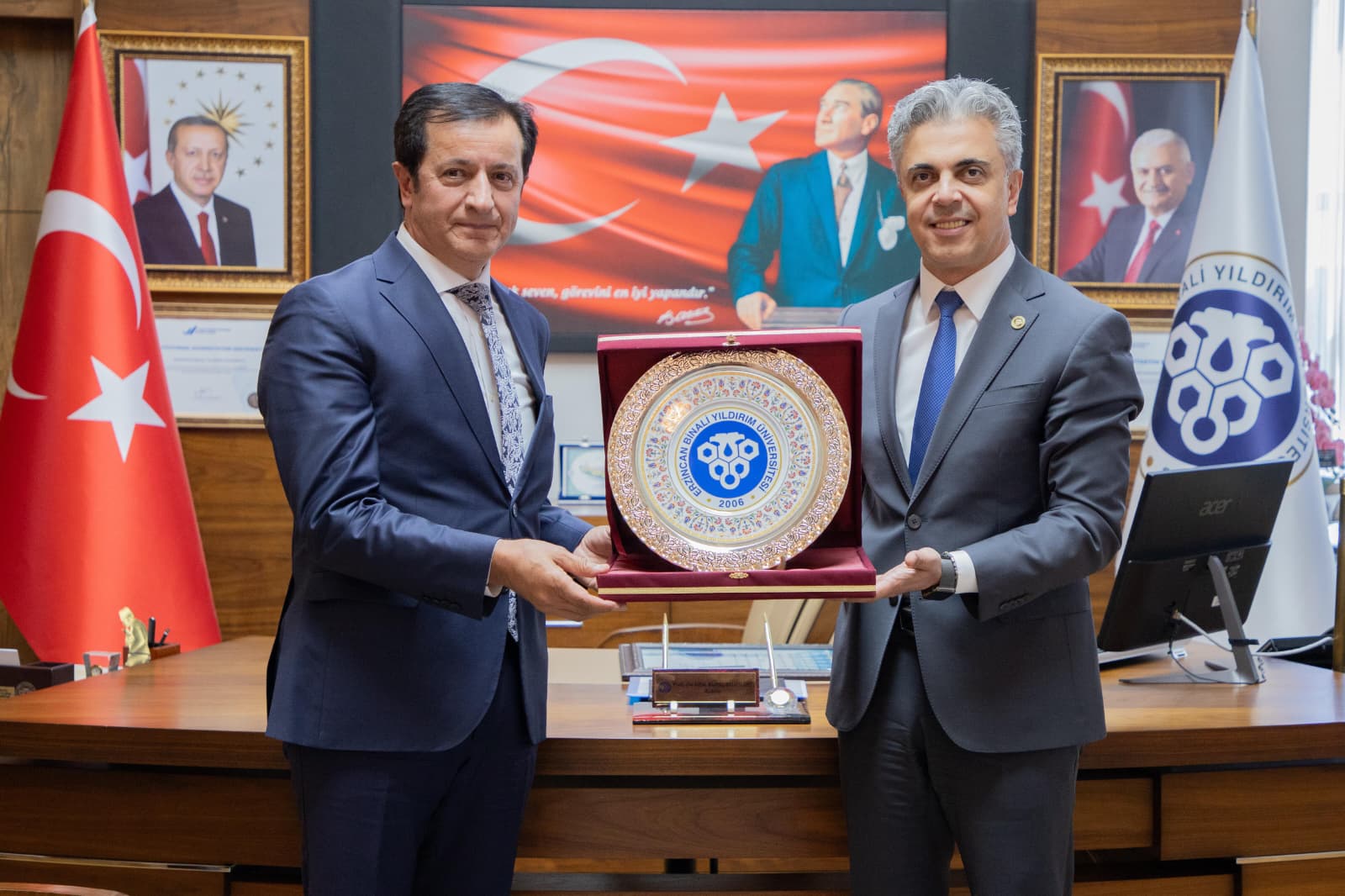Görselde, Rektörümüz ve Erzincan Binali Yıldırım Üniversitesi Rektörü yer almaktadır.
